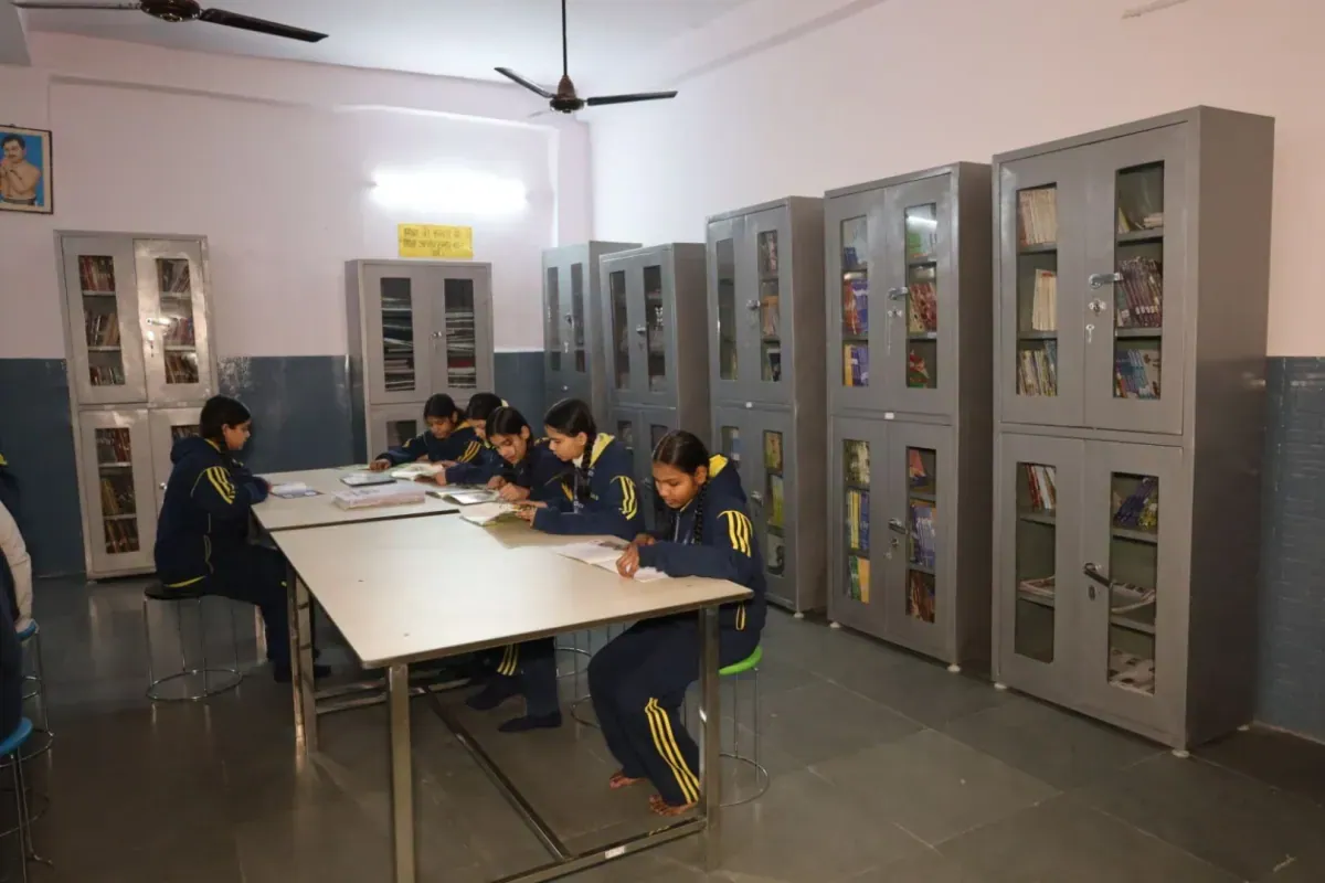 Students reading in the school library